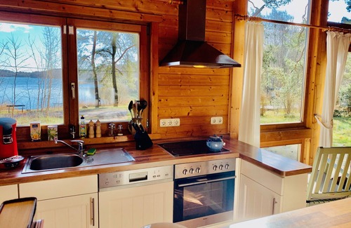 Rutenberg House | Your beautiful house on the lake with a fireplace, sauna and great lake view! With e-charging station