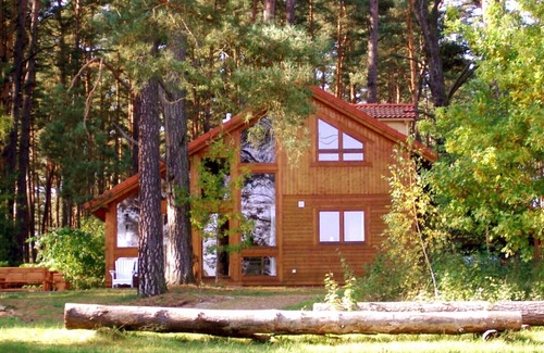 Rutenberg House | Your beautiful house on the lake with a fireplace, sauna and great lake view! With e-charging station