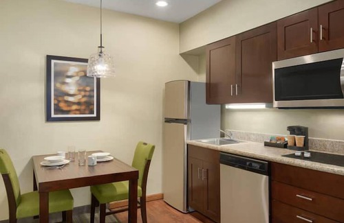 Feather Sound Hotel | Your Home Away From Home! Free Breakfast, Outdoor Pool, Full Kitchen!