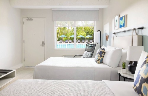 New Town House | Your Island Base | 3 Pool View Rooms at Fun & Breezy Blue Flamingo Resort