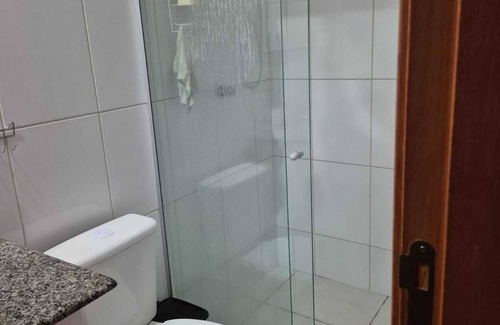 Buritis Apartment | Zen suit room, hot shower, balcony with a view and garage