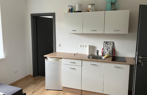 Rotgesbuttel House | Zimmer mit Bad und Küche