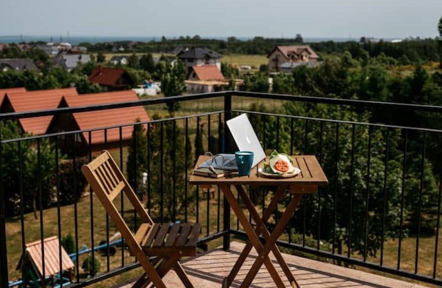 15 A Beautiful Studio With a View of the City and the sea