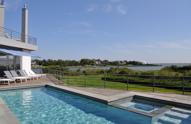 2-acre waterfront home with stunning views, pool, private beach & deepwater dock