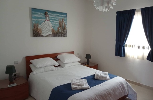 3 Bed 2 Bath Home with A/Cs and Ample Parking