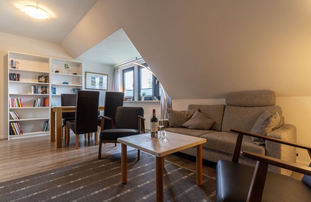 3-room apartment on the 1st floor of a detached house with infrared cabin and balcony.