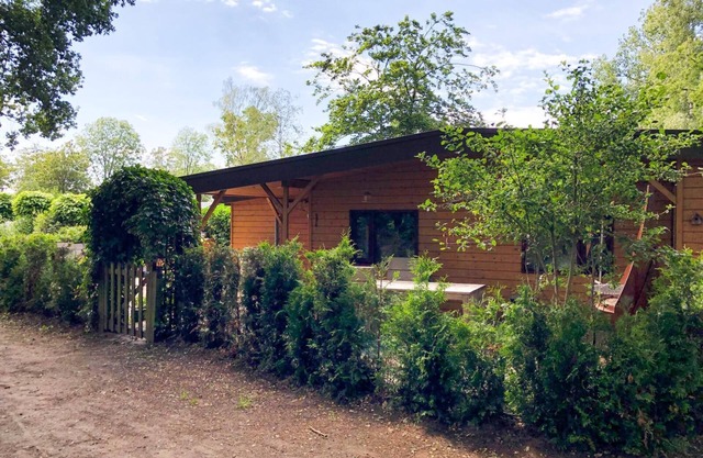 4 person Woodhouse bungalow with jacuzzi and sauna