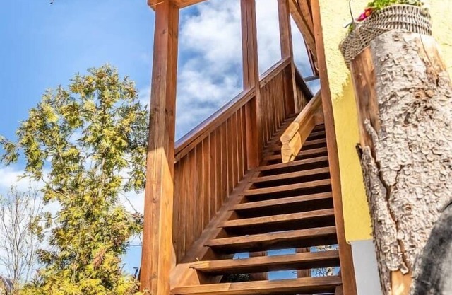 4-star vacation apartment Abendrot (75 m2) with small balcony and sunbathing lawn with outdoor seating area