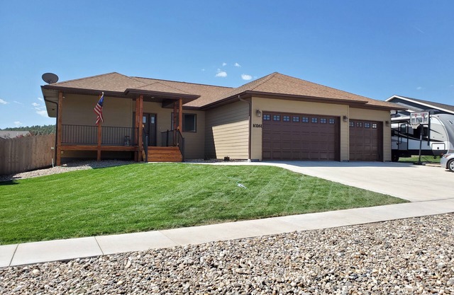 5 bedrooms, covered deck, whirlpool tub and full access to the Black Hills