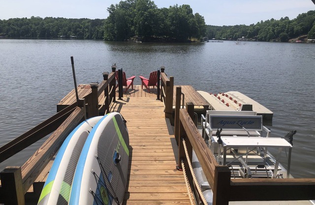 6 bed Pontoon Boat and jet ski rental, hot tub, pool table, trampoline & more