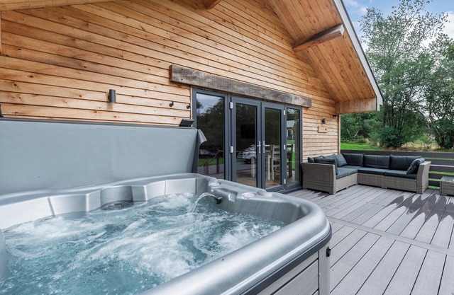 A beautiful lodge in tranquil surroundings with a hot tub - perfect.