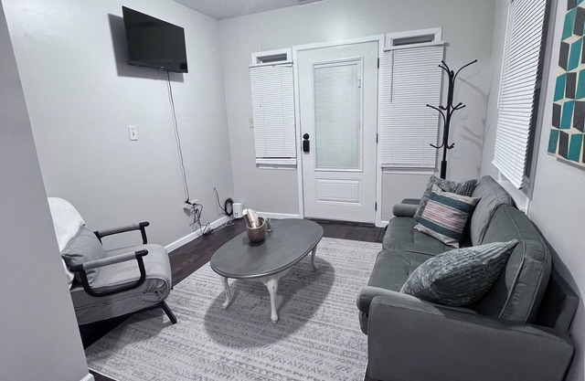 A big "Tiny" home, with large enclosed yard, next to train in downtown Westmont.