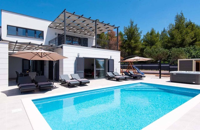 A family villa with a pool, gym and a sauna