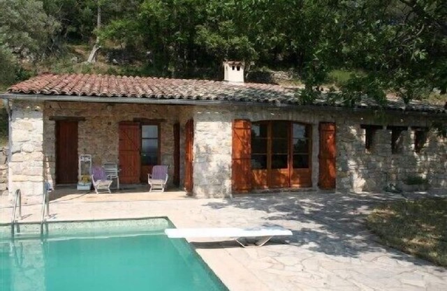 A haven of peace in a wild setting with an olive grove garden pool