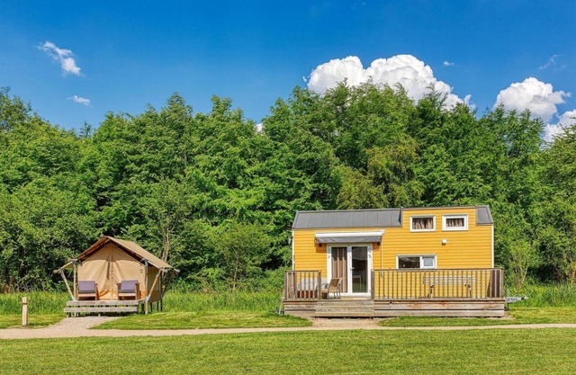 A luxury tiny house with extra sleeping lodge
