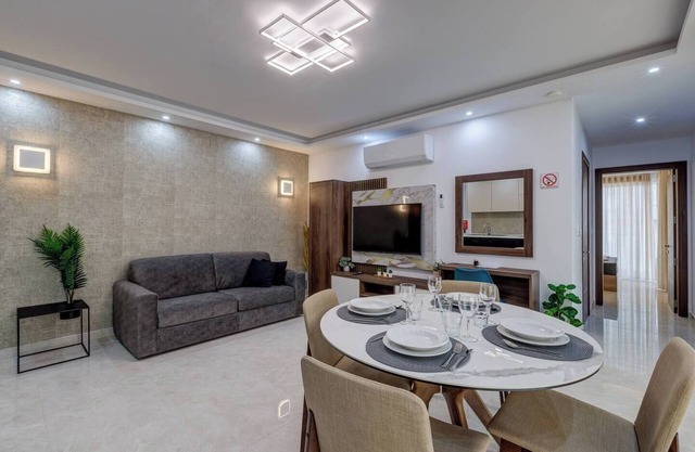 A modern apartment block in the heart of Bugibba. All one-bedroom flats, stylishly finished and fully equipped with comfort, ideally located close to shops, services, and all amenities.
