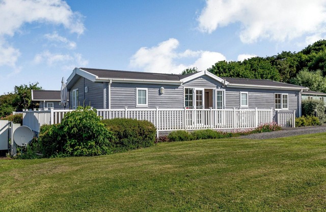 A Nordic Style 6 berth Luxury Lodge with raised veranda on 3 sides.