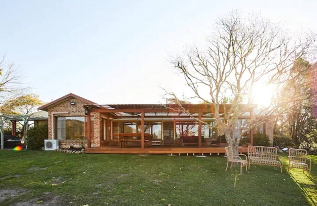A rural retreat on 15 acres with swimming pool and direct river access.