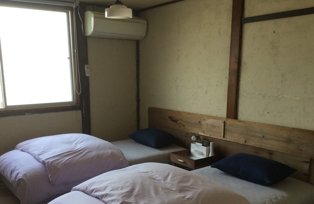 A traditional Japanese wooden small house in downtown. Accessible and convenient