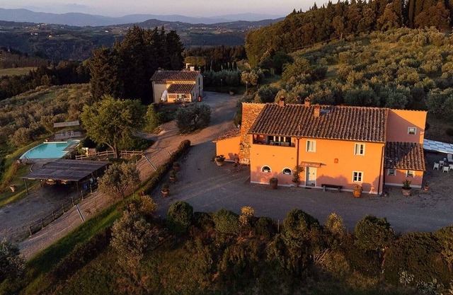 Amazing florentine Villa Casale strategically oriented at the top of one of the most perfectly ...
