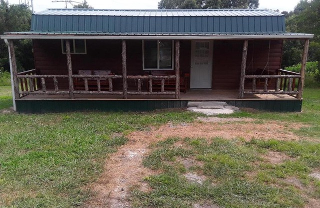 Amish made cedar cabin with a loft on a buffalo farm close to the Buffalo River