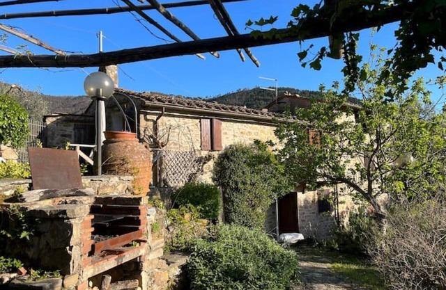 Ancient Tuscan style country house with a view of the Pisan Mountains