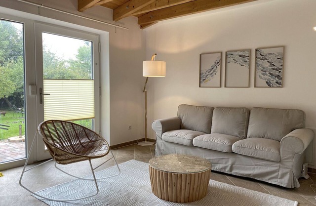 "Ankerplatz" vacation apartment with large garden in the heart of Pilsum