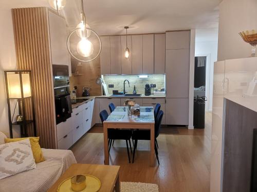 Apartament pod modrzewiem
