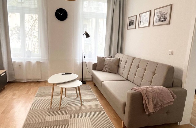 Apartment Mitten in der Stadt mit Garten und Grill