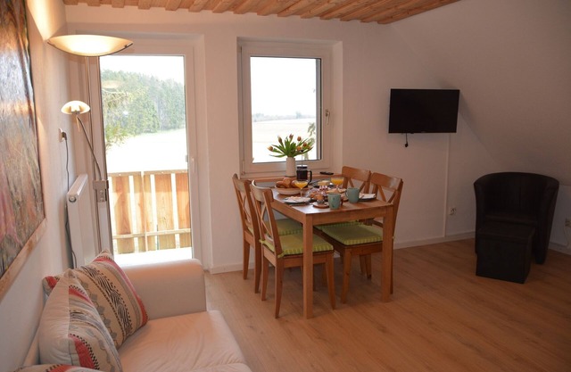 Apartment with eat-in kitchen and balcony