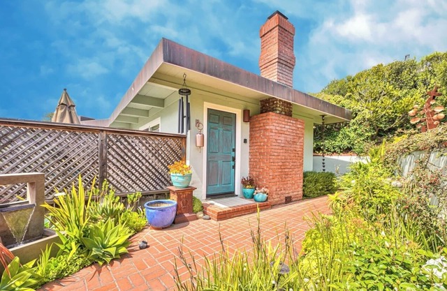 "Atherton Cottage has been remodeled & has two Fireplaces!