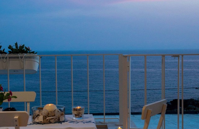 Beachfront 2nd floor apartment with terrace located east with sunset