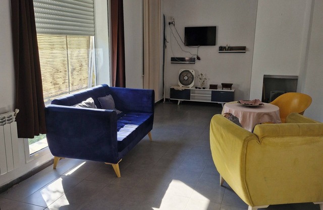 Beautiful new s+2 with garden and motorized garage in a residential.