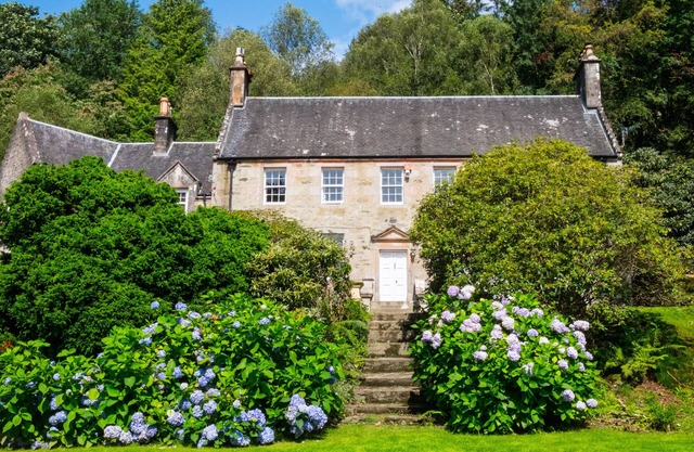 Beautiful waterside historical country house with magnificent garden