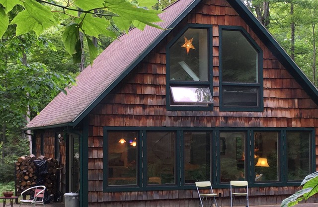 Beaver Island Chalet 2BR, 2BA sleeps 6, big windows overlooking lovely woods.