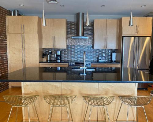 Boston Harbor views Modern north end condo FREE PARKING!