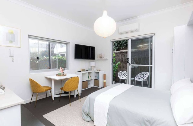 Bright beachfront studio with terrace & aircon