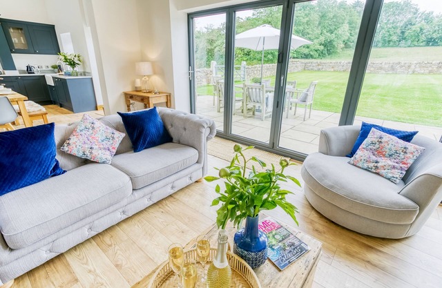 Carrog Barn - a ground floor bedroom that sleeps 6 guests in 3 bedrooms