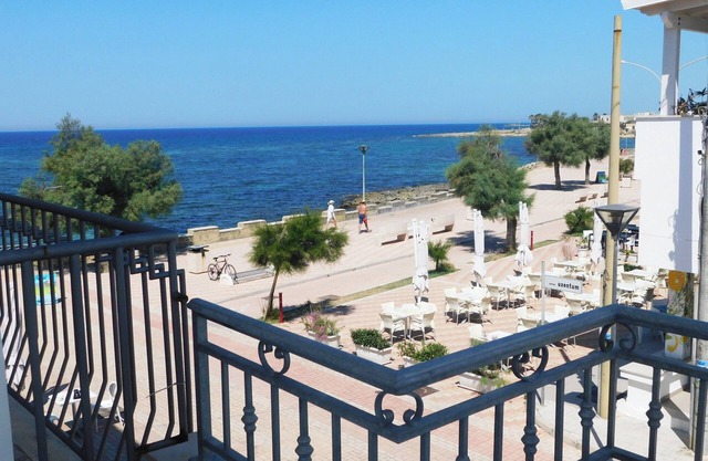 Central Apartment by the Ionian Seaside with Balcony, Sea View & Air Conditioning