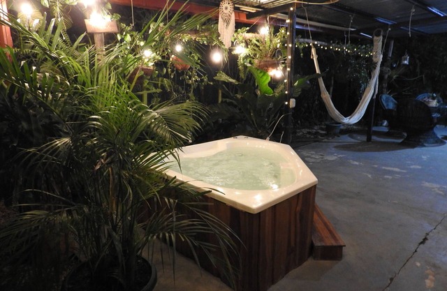 Charming 2-bedroom beach house in CR's only Blue Zone with AC, WiFi and Jacuzzi.