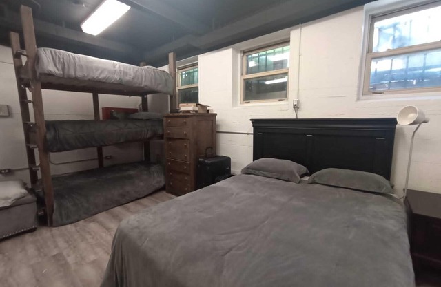 Charming Prohibition-Era Speakeasy Lounge with Bedroom and Commercial Kitchen