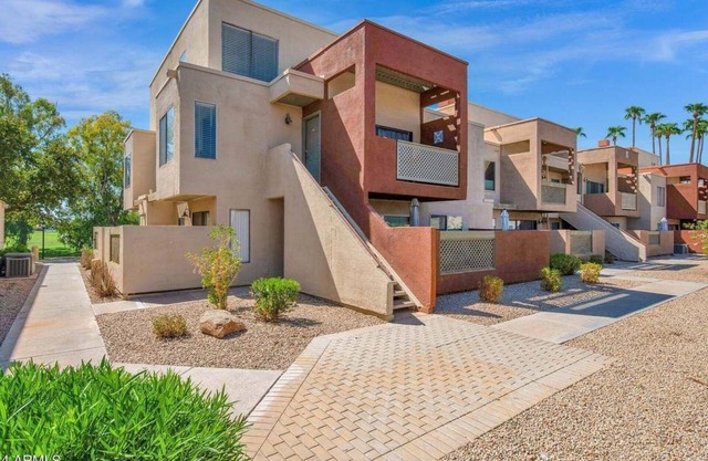 Chic 1 and 1/2 bedroom + loft condo in Scottsdale with community pool + gym