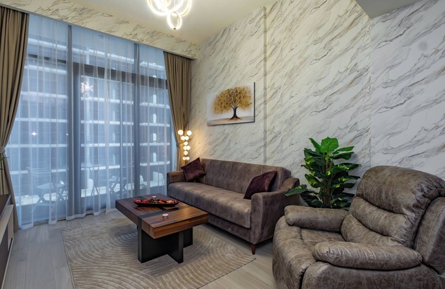 Chic 1-bedroom with fitness Swiming pool , WiFi in awesome Dubai