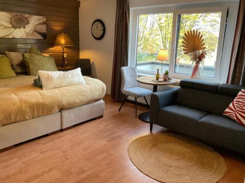 Comfortabele Familie Suite met 2 slk, speelzolder, balkon, Airco
