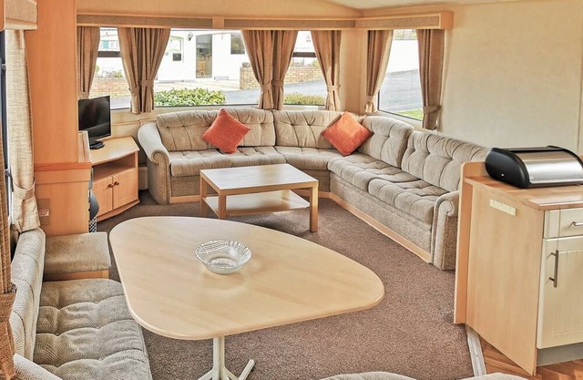 Comfortable and spacious 12ft-wide caravan with one double and two twin.