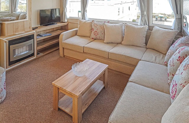 Contemporary 12ft-wide caravan with one double and one twin.