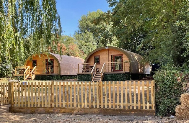Cosy and eco-friendly cabins next to 16th century pub