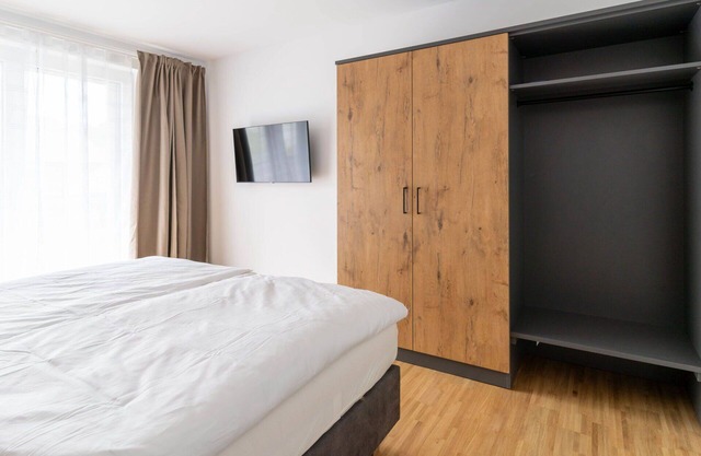 Cosy apartment for 4 people with WIFI, TV, patio and parking