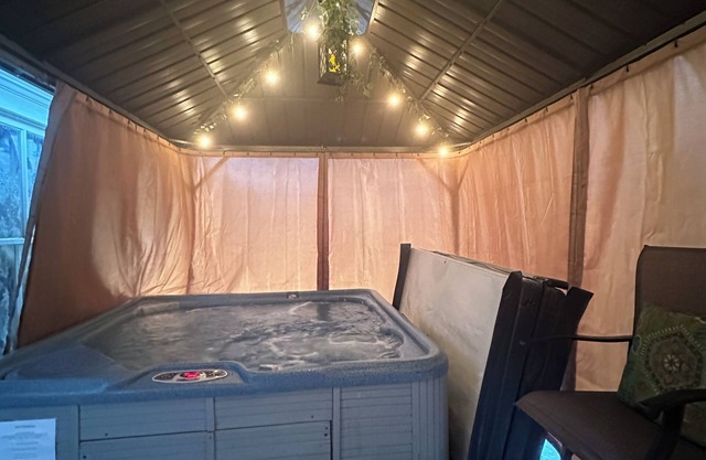 Cozy Chic of Cheboygan: Private Main Level - Hot Tub, Tanning & Massage Chair!