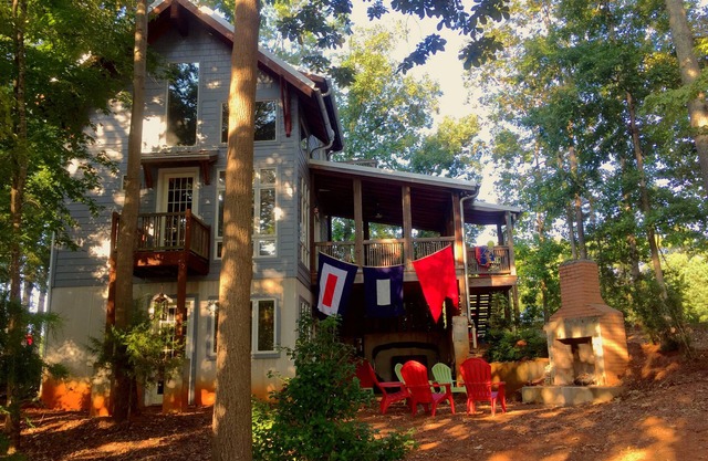 Custom Lake Norman cottage on private road, built in 2012. Modern, private.